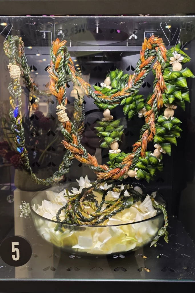 Tropical floral compositions during the Spirit of Aloha show at IPM ESSEN 2026, supported by BouquetMat as a professional floral backstage and premium display solution.