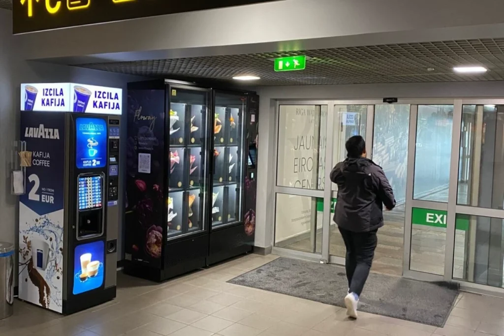Flowey flower vending machine Riga Airport arrivals terminal 24/7 flowers