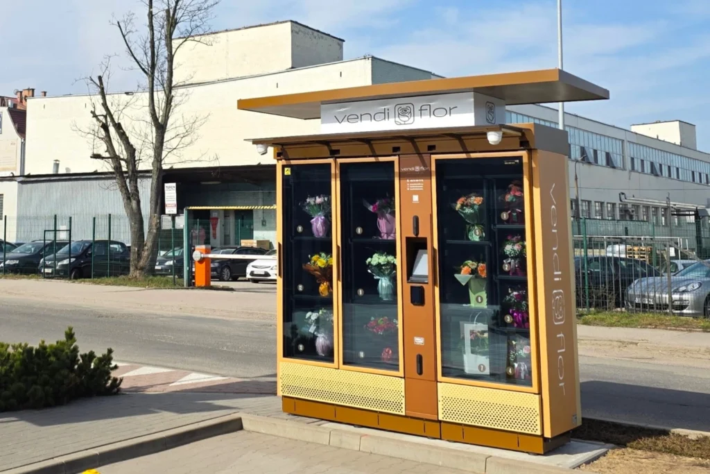VendiFlor flower vending machine with a large roof canopy and side branding, demonstrating the customization possibilities of modern flower vending machines.